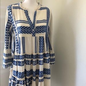 white dress with blue design